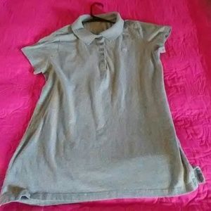 A grey polo shirt